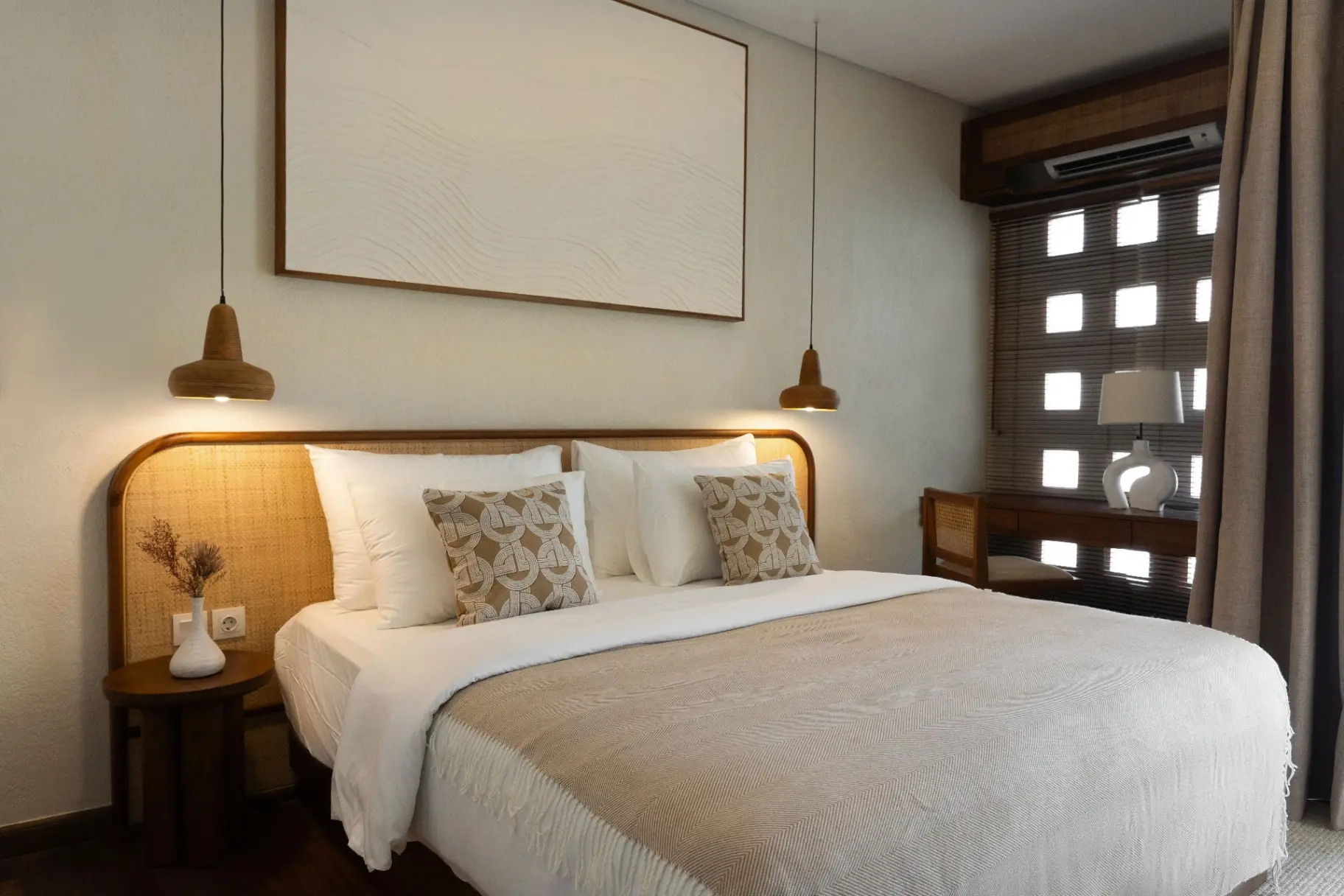 Two spacious bedrooms with king-size beds ensuite bathrooms and calming décor