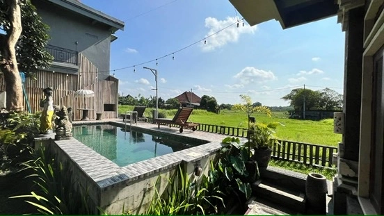 A spacious room in a guesthouse South of Ubud — image 4