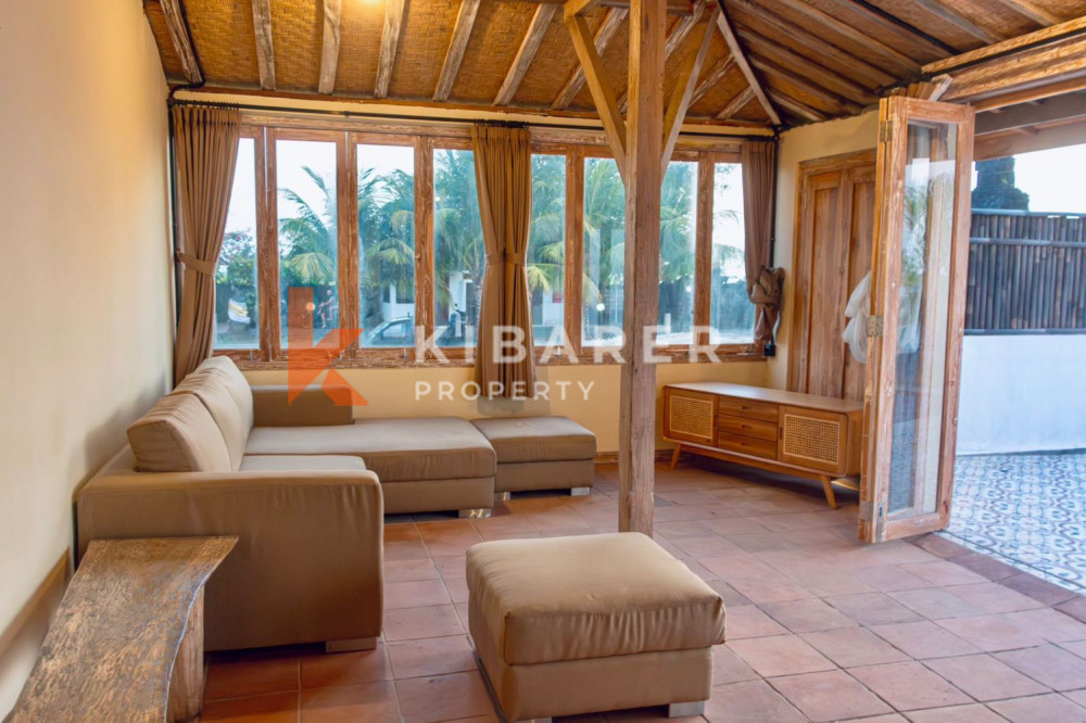 Semi Furnished Three Bedroom Closed Living Villa with Ocean and Rice Field View in Kedungu — image 3