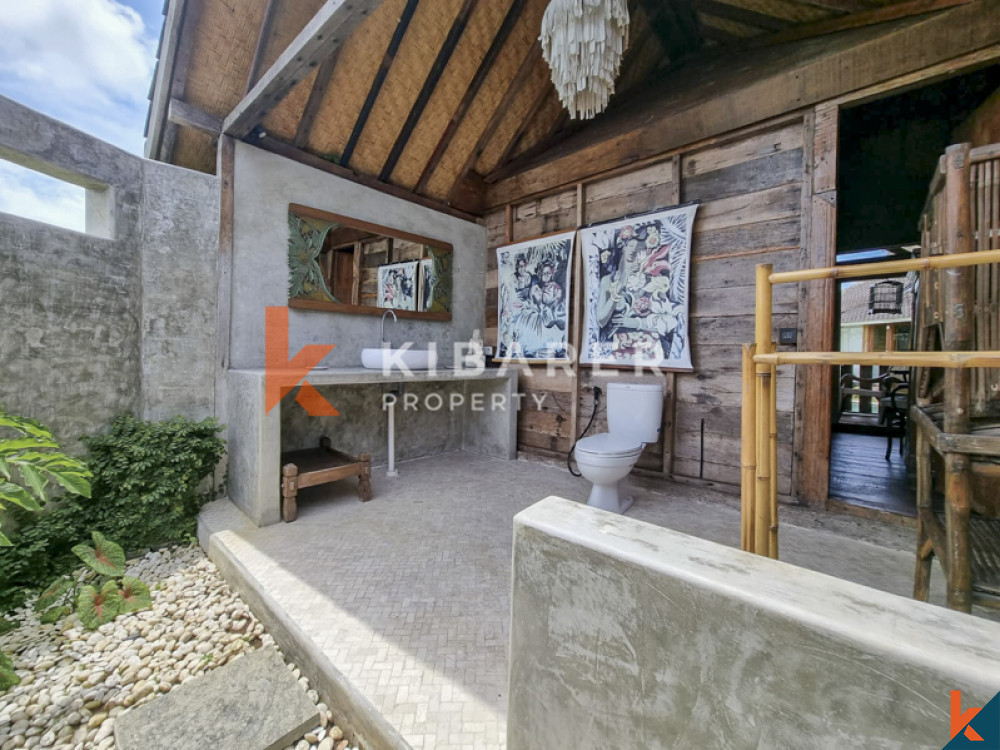 Traditional Four Bedrooms Closed Living Joglo with Rice Field View In Cemagi — image 10
