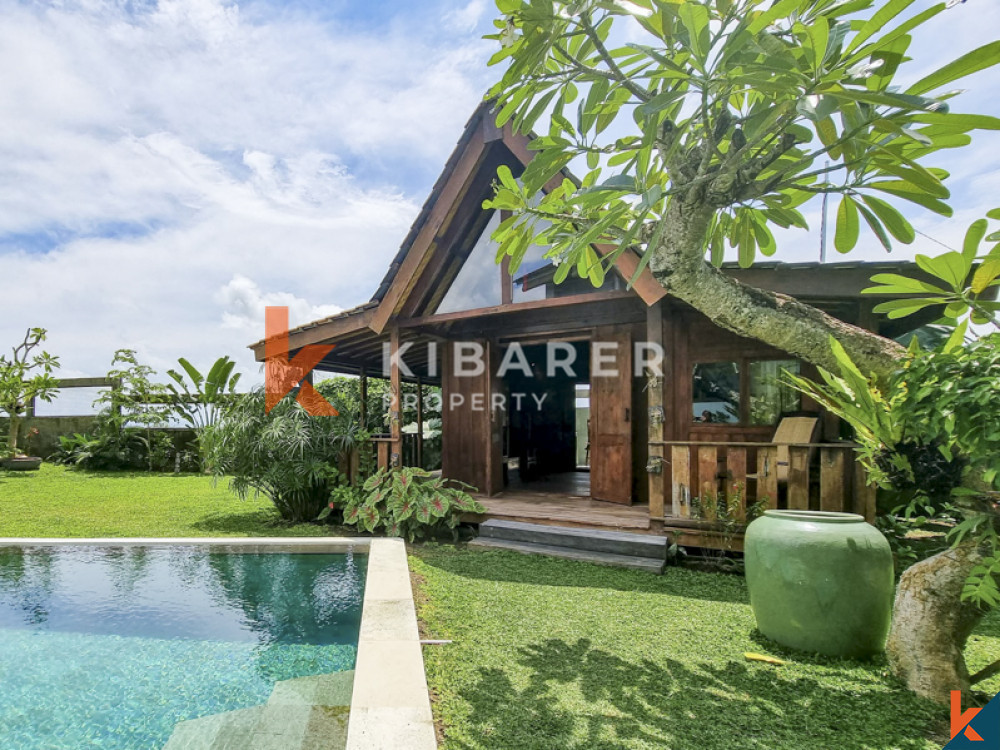 Traditional Four Bedrooms Closed Living Joglo with Rice Field View In Cemagi — image 9