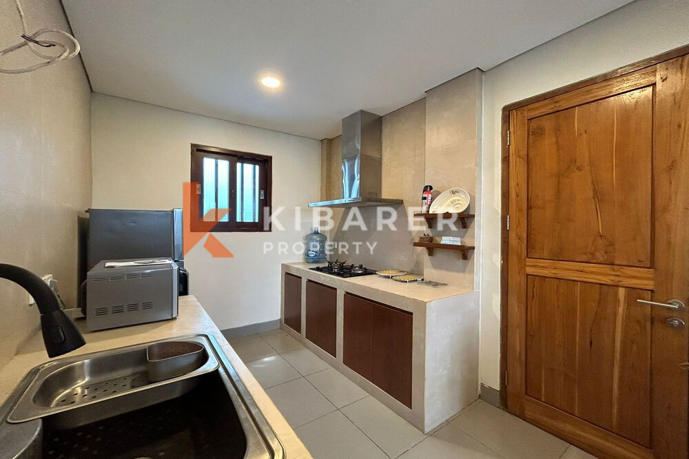 Beautiful Two-Bedroom Villa with Enclosed Living Room and Pool in Ungasan — image 11
