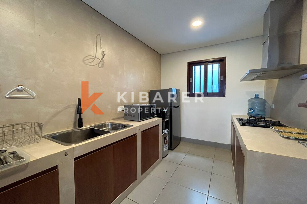 Beautiful Two-Bedroom Villa with Enclosed Living Room and Pool in Ungasan — image 12