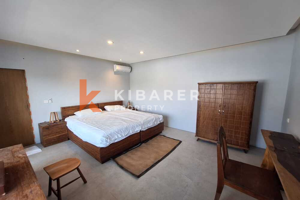 Charming Modern Two-Bedroom Villa with Enclosed Living Room in Tumbak Bayuh — image 9