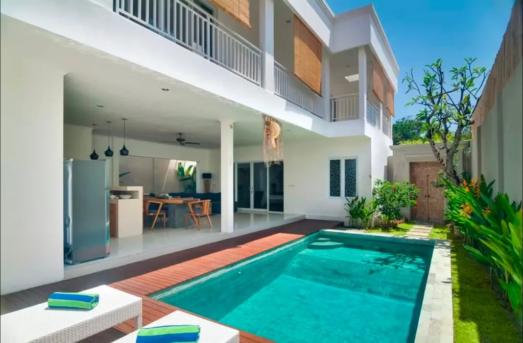 Modern 3-bedroom villa in Canggu with private pool, rooftop terrace, and banana field views — image 6