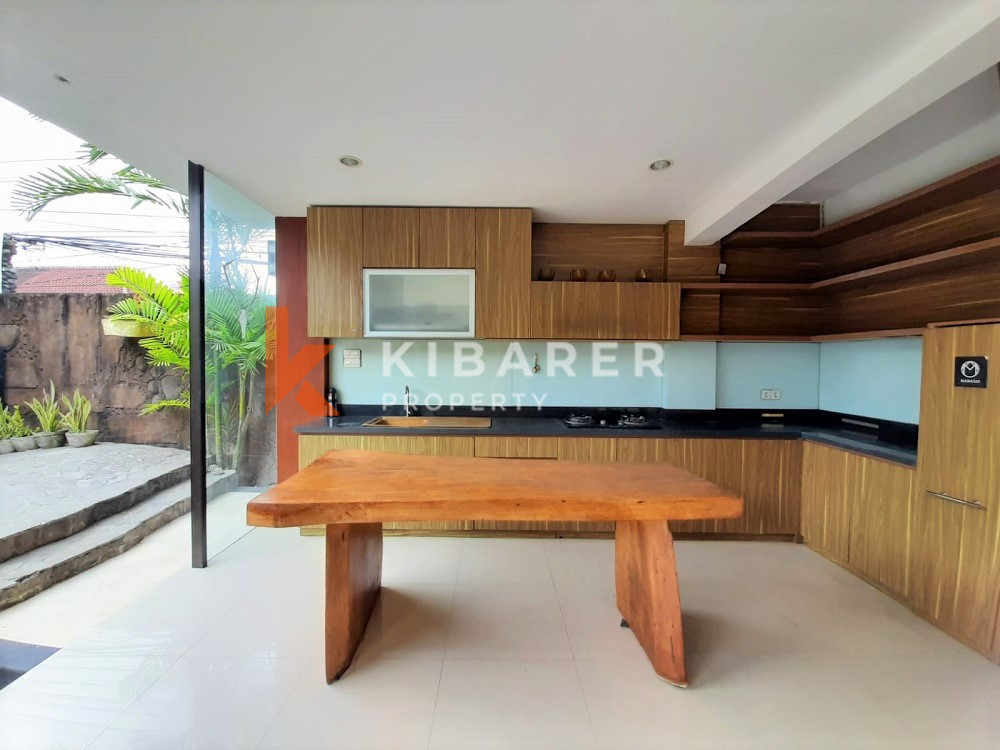 Unique Three-Bedroom Villa with Natural Stone Design and Forest in Umalas — image 4