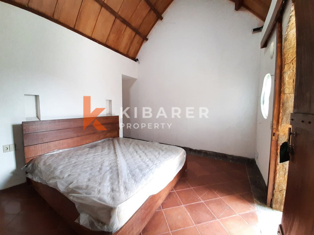 Unique Three-Bedroom Villa with Natural Stone Design and Forest in Umalas — image 17