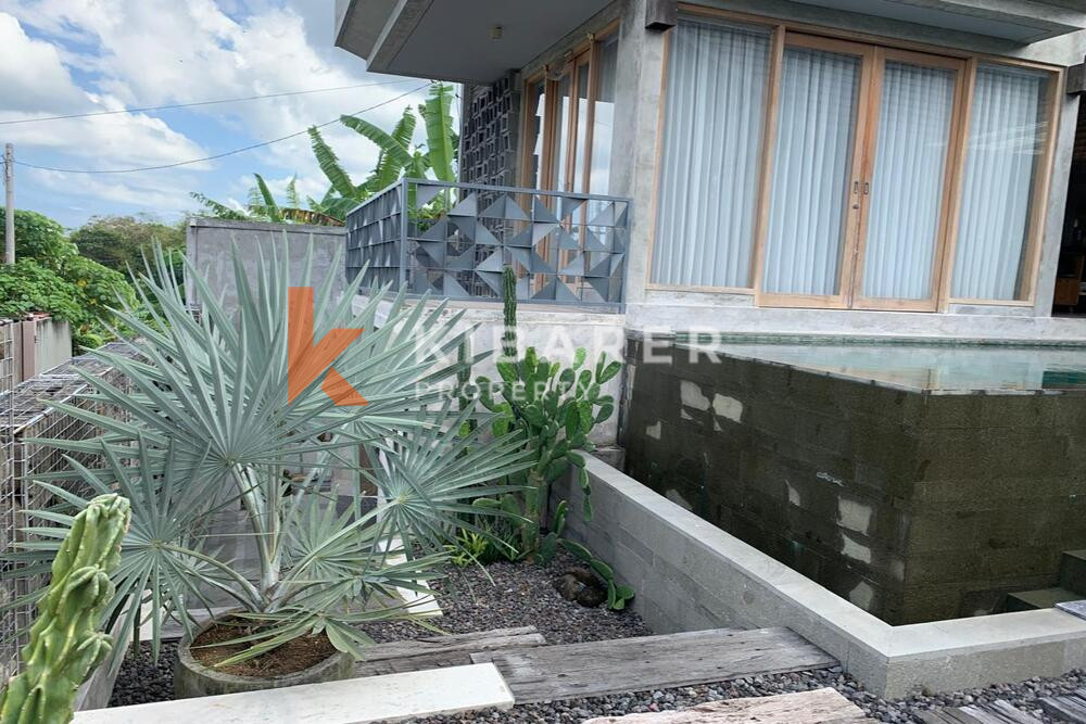 Charming Three-Bedroom Industrial Open Living Room Villa in Canggu — image 5