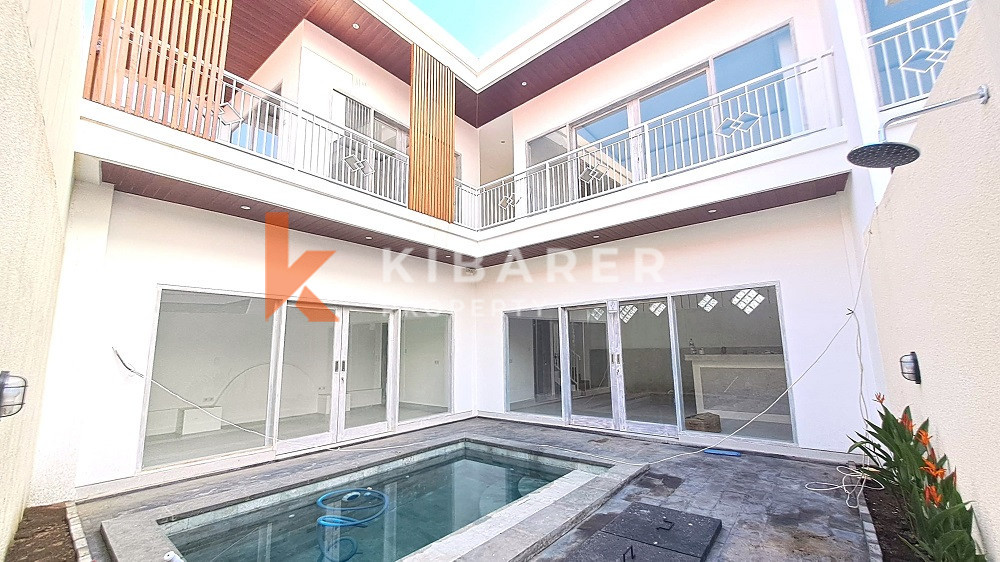 Unfurnished Three Bedroom Enclosed Living Villa with Balcony Located in Canggu Area