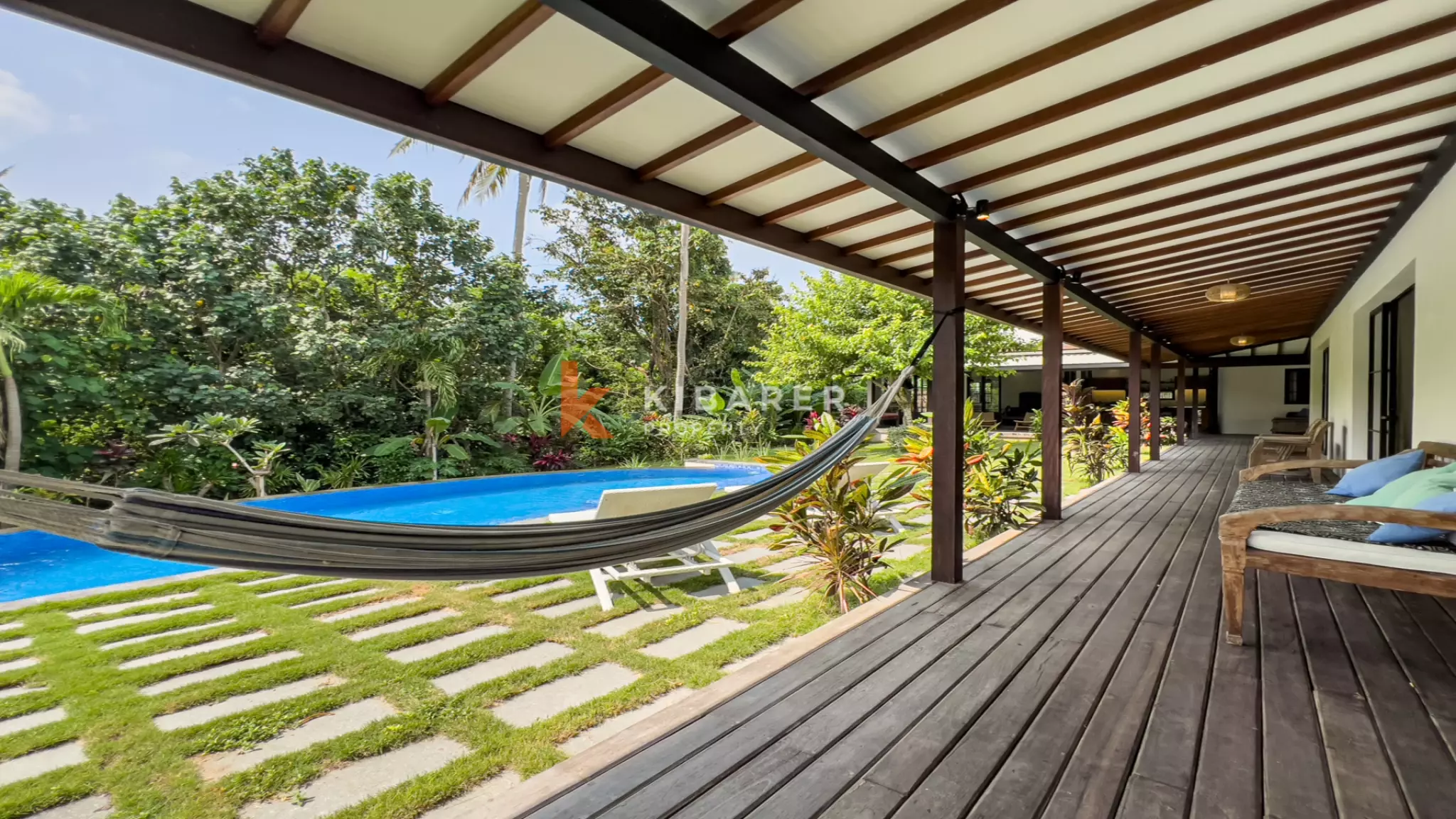 Elegant Four-Bedroom Villa with Enclosed Living Room, Pool & Lush Garden — image 5