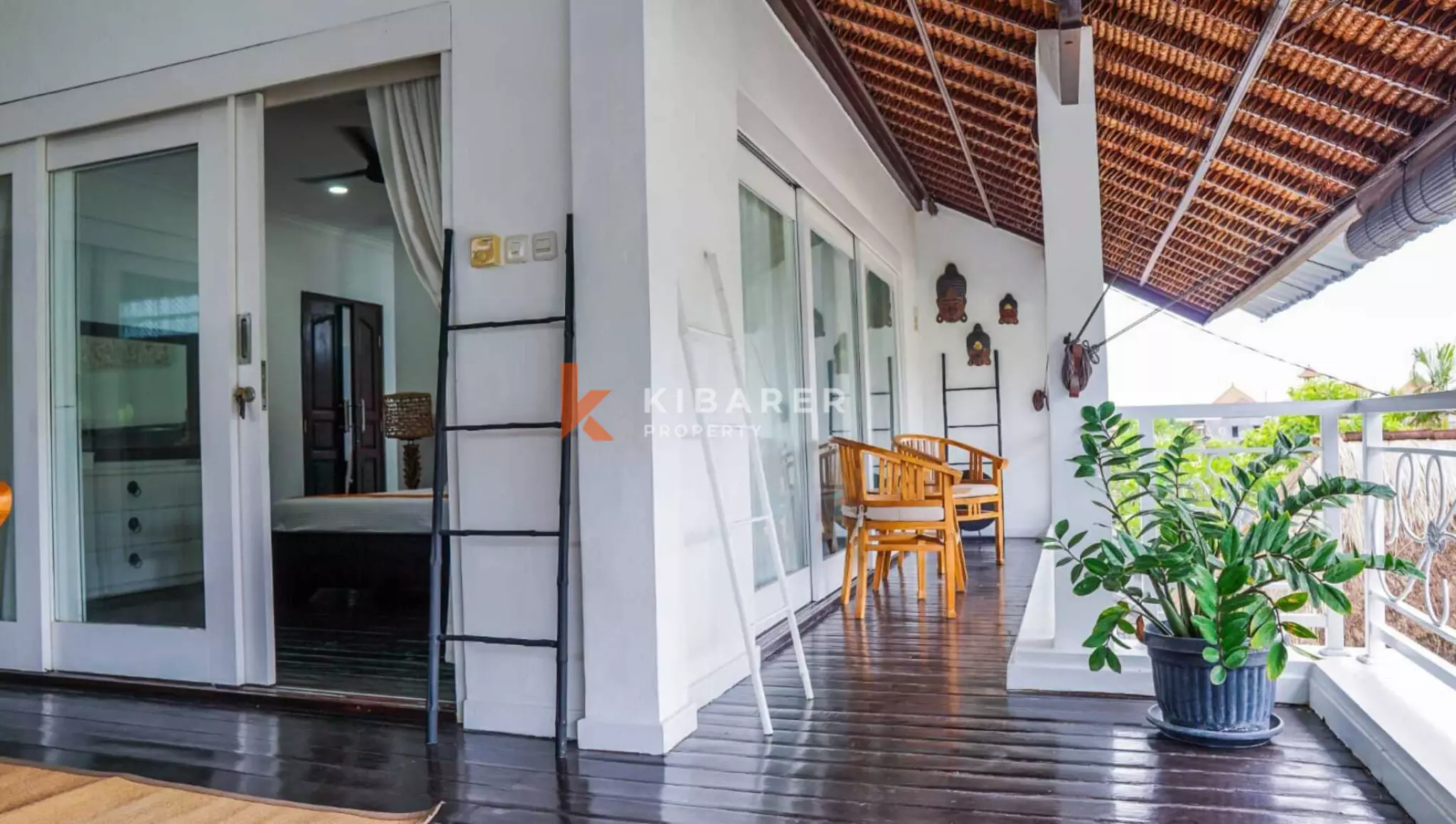 Traditional Open Living Room Three-Bedroom Villa with Tropical Touch in Mertanadi — image 11