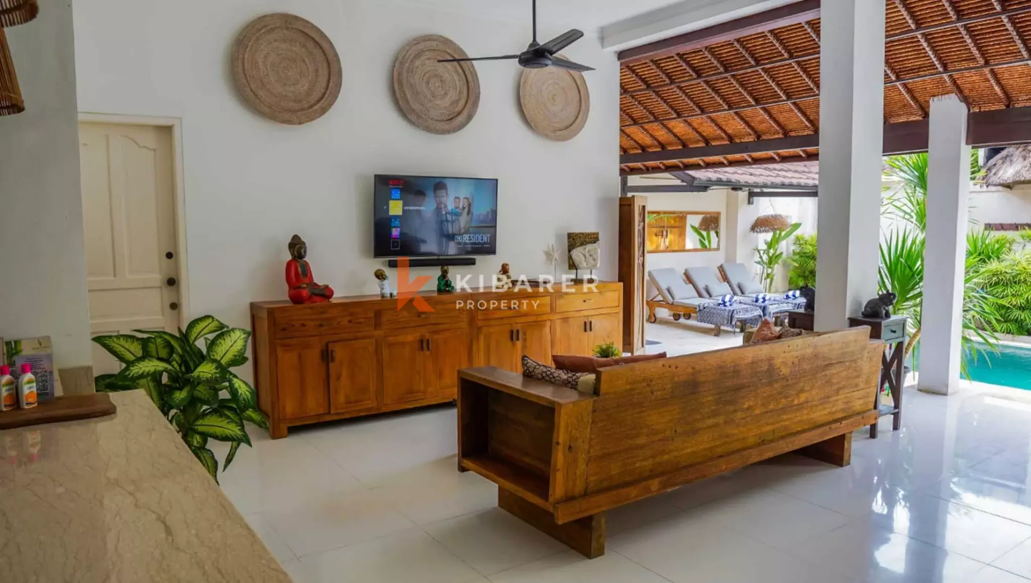 Traditional Open Living Room Three-Bedroom Villa with Tropical Touch in Mertanadi — image 2
