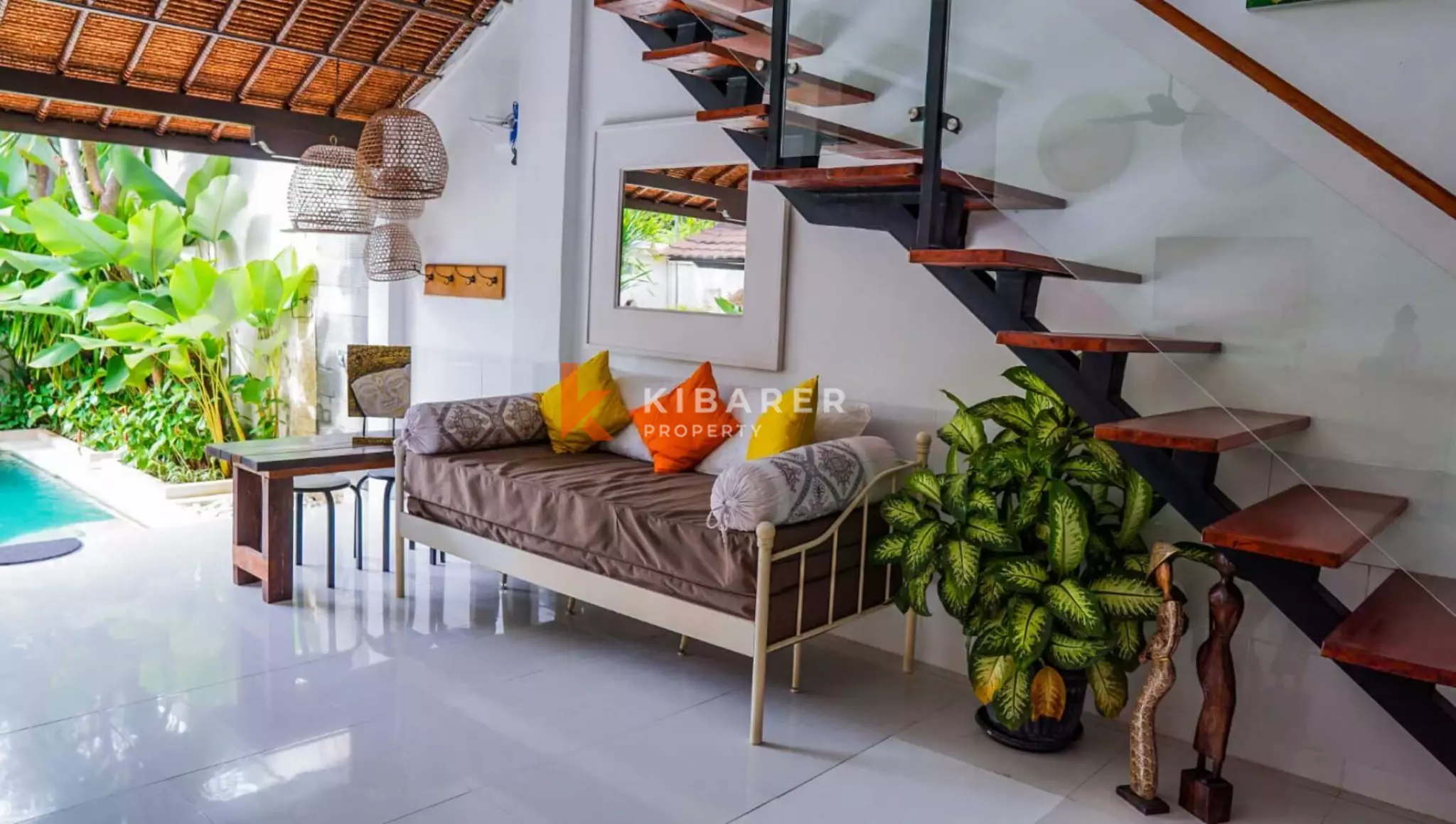 Traditional Open Living Room Three-Bedroom Villa with Tropical Touch in Mertanadi — image 5