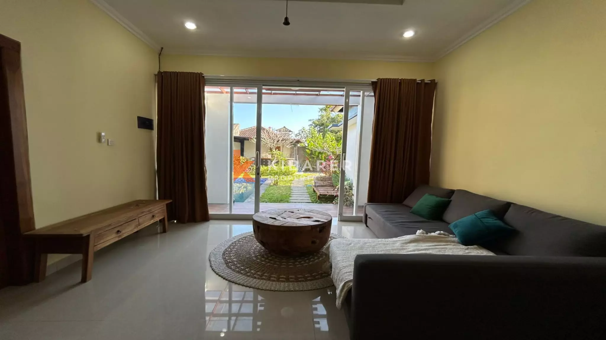 Homey Three Bedroom Enclosed Living Room Villa in Sanur — image 15