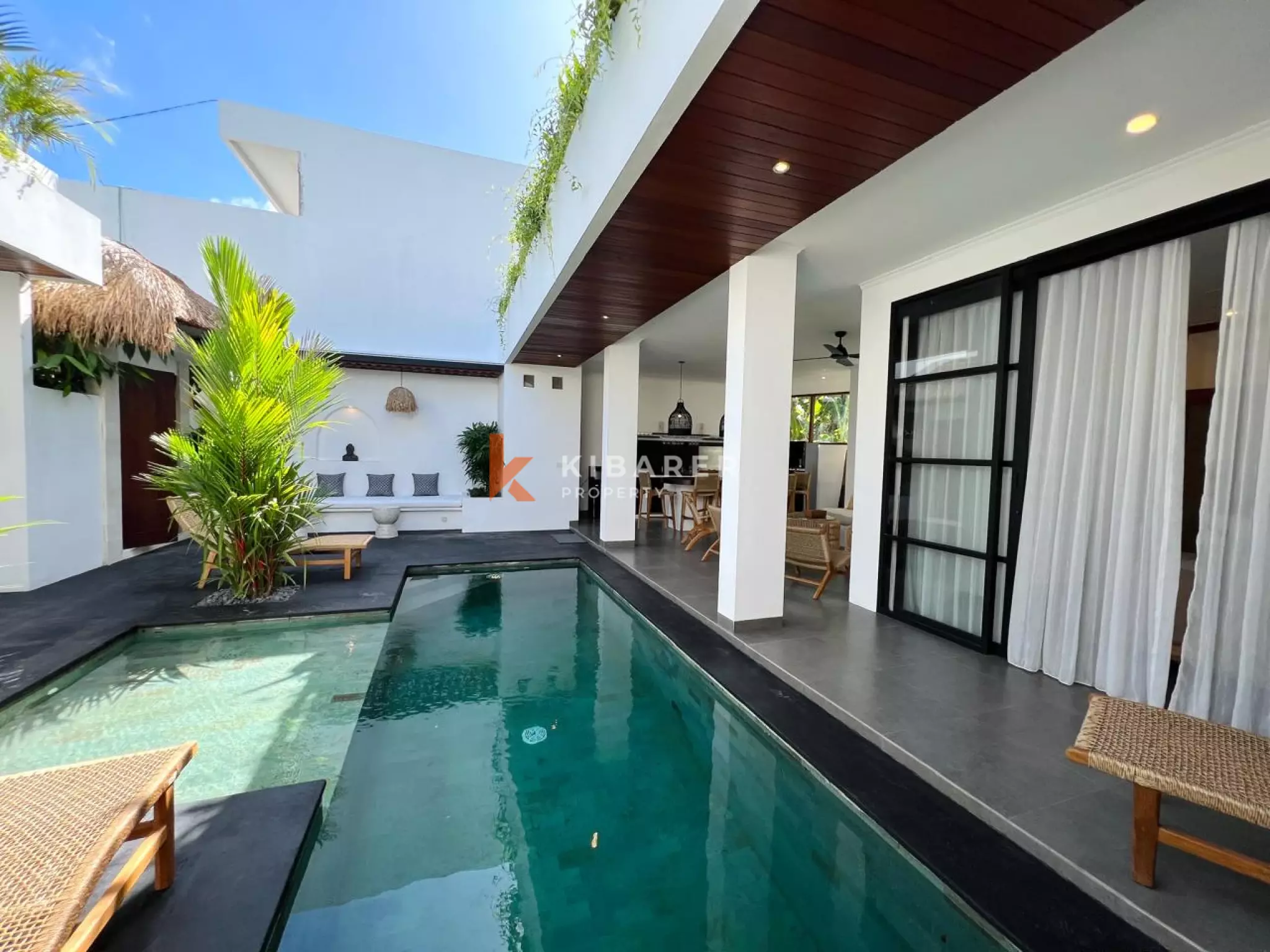 Three-Bedroom Tropical Modern Style Villa with Open Living Room & Rooftop Terrace in Tumbak Bayuh