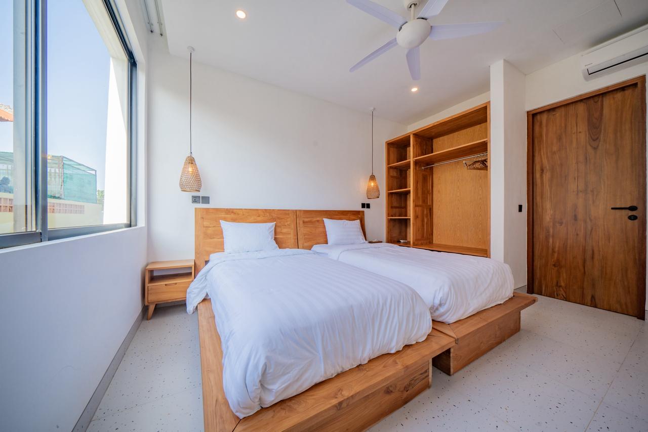 Spacious 4-Bedroom Villa with Rooftop Sunset Lounge for Yearly Rent in Umalas — image 12
